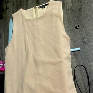 I’m selling a tan dress. It’s a size Medium.